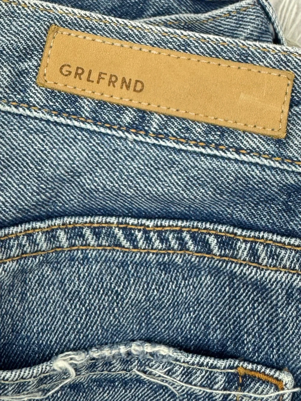 GRLFRND denim Beverly button fly distressed hem long shorts sz 29